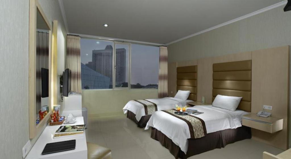 Oyo 235 Maumu Hotel & Lounge Surabaya Esterno foto